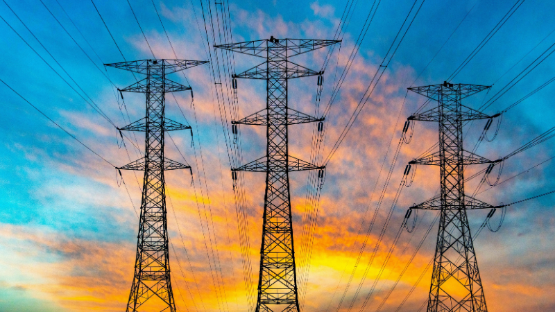 Electricity pylons at sunset